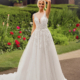 Floral, A-line wedding dress with sparkle underlayer by Phoenix Gowns