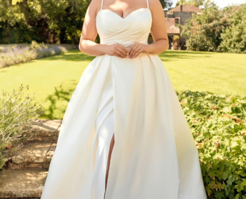 Satin wedding dress from our curve range with beaded neckline and front split