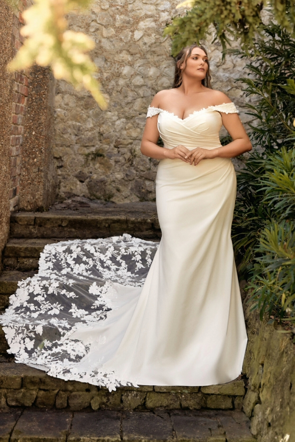 Ivory, fit and flare dress in crepe with lace train and off the shoulder detail