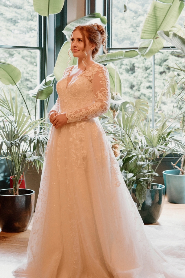 A line wedding dress with sleeves and all over lace and sparkle