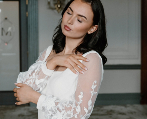 Fit and flare, crepe wedding dress with detachable sleeves