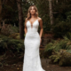 Fit and flare lace wedding dress with plunge neckline