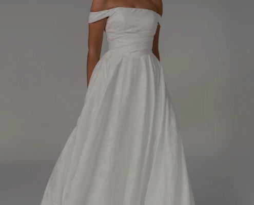 Textured Satin wedding dress with off the shoulder sleeves by Tania Olsen