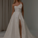 Jacquard satin wedding dress with statement bow and one shoulder by Tania Olsen
