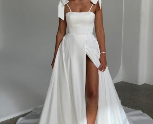 Satin Wedding dress with detachable bow straps and front leg split in Ivory by Tania Olsen