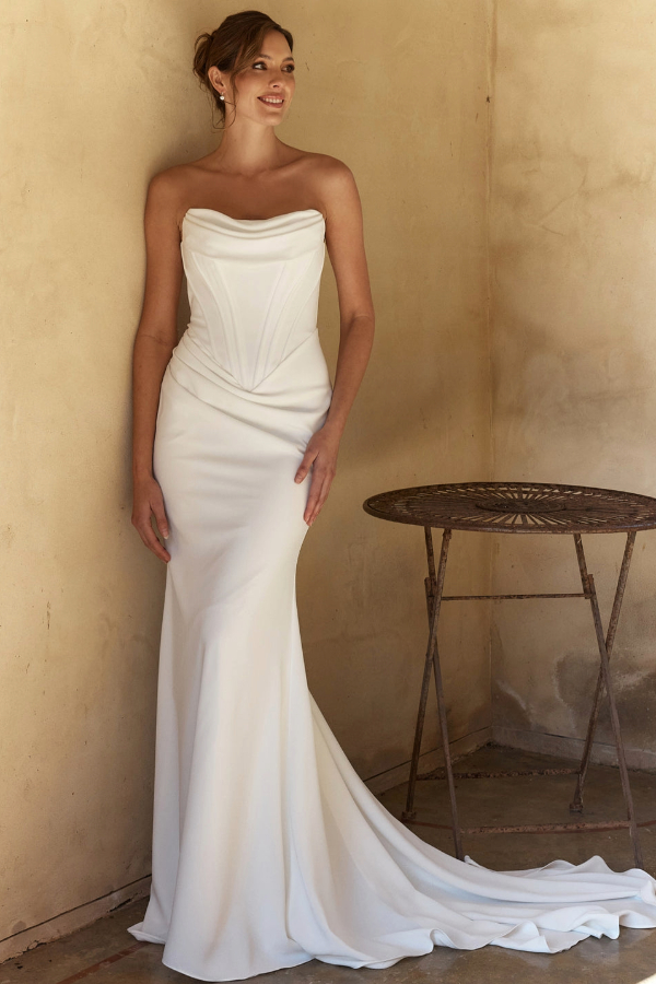 Fit and flare wedding dress made from stretch crepe with boned bodice