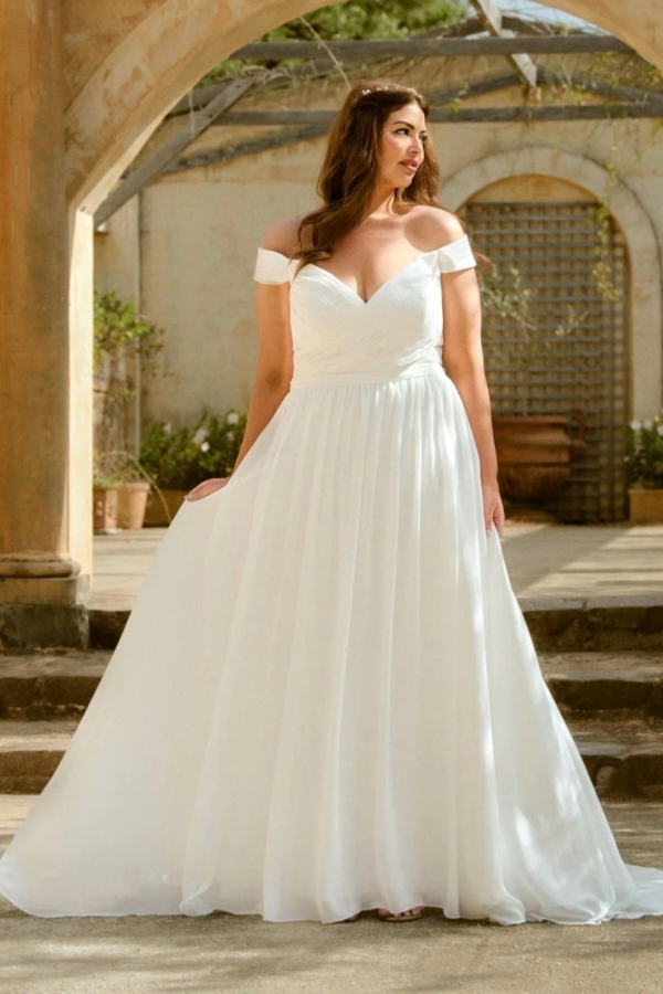 Flowing chiffon wedding dress with pleated bodice